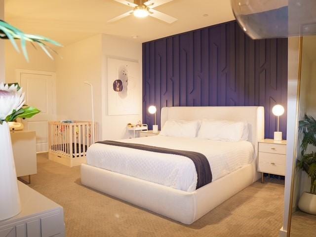 bedroom featuring a ceiling fan and carpet flooring