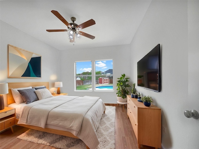 bedroom featuring a ceiling fan and wood finished floors