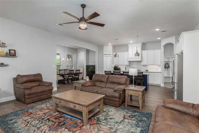 616 Point Vista Dr, Aledo, TX 76008 - living room with recessed lighting, arched walkways, a ceiling fan, and dark wood-style flooring