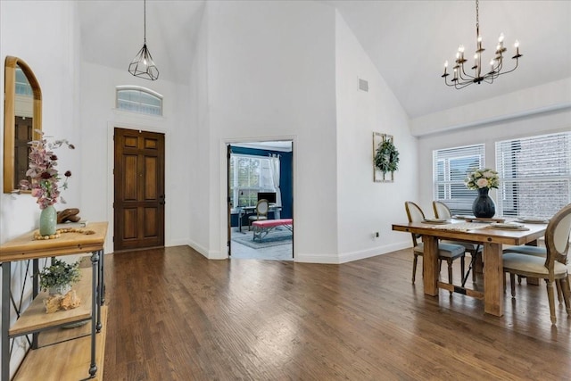 1102 Brigham Dr, Forney, TX 75126 - foyer with high vaulted ceiling, a chandelier, wood finished floors, and baseboards