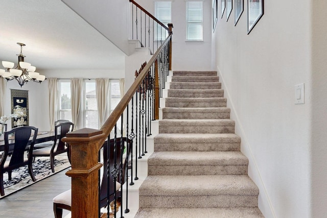 1979 Frediano Ln, Mclendon Chisholm, TX 75032 - stairway with a wealth of natural light, a notable chandelier, and baseboards