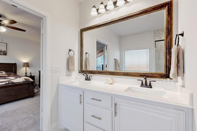 1979 Frediano Ln, Mclendon Chisholm, TX 75032 - bathroom featuring a sink, ceiling fan, double vanity, and ensuite bath
