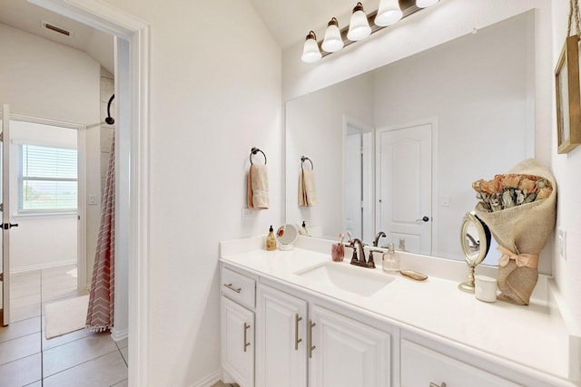 1979 Frediano Ln, Mclendon Chisholm, TX 75032 - bathroom with a shower with shower curtain, tile patterned floors, visible vents, lofted ceiling, and vanity