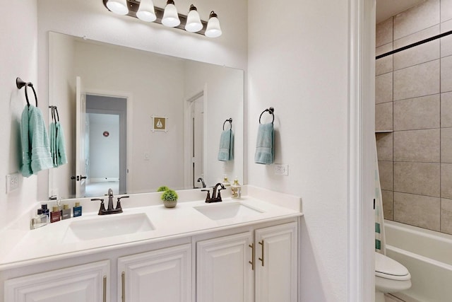 1979 Frediano Ln, Mclendon Chisholm, TX 75032 - full bathroom with toilet, shower / washtub combination, double vanity, and a sink