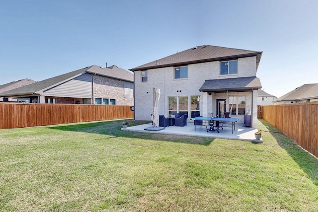 1979 Frediano Ln, Mclendon Chisholm, TX 75032 - rear view of house featuring a yard, a patio area, and a fenced backyard