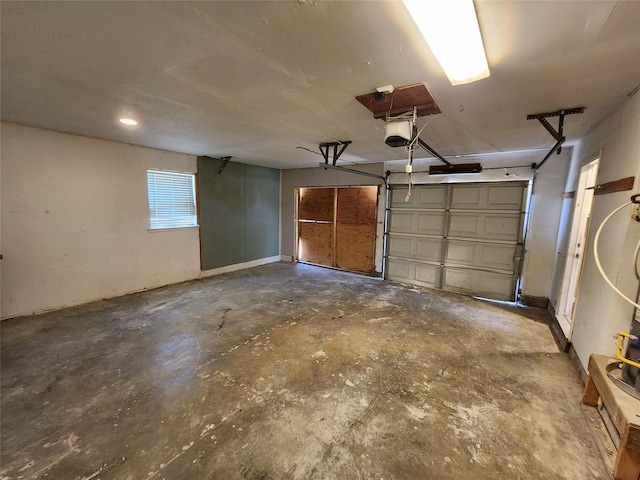 garage featuring a garage door opener