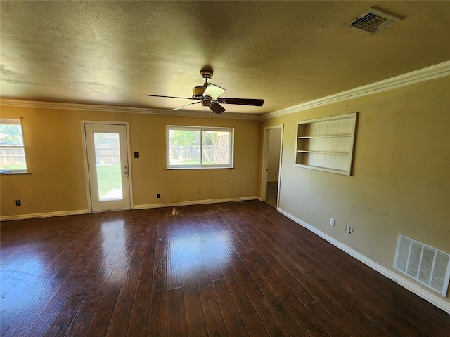 spare room with visible vents, a ceiling fan, hardwood / wood-style floors, and a textured ceiling