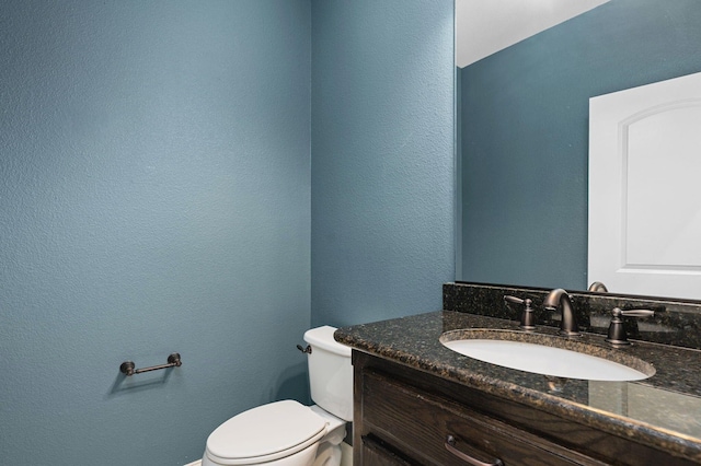 3 Asheville Ln, Trophy Club, TX 76262 - bathroom with vanity, toilet, and a textured wall