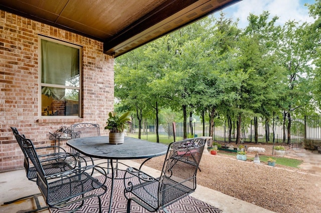 3 Asheville Ln, Trophy Club, TX 76262 - view of patio / terrace featuring outdoor dining space and fence