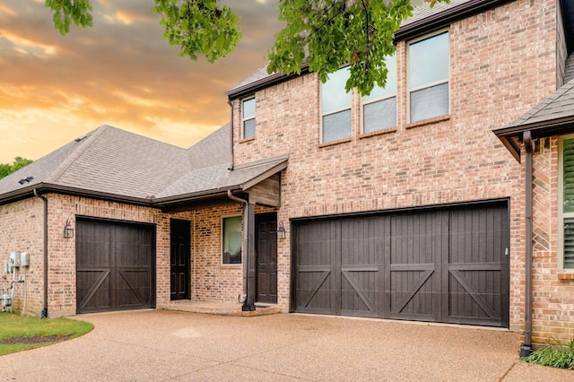 3 Asheville Ln, Trophy Club, TX 76262 - view of front of house featuring driveway, brick siding, roof with shingles, and a garage