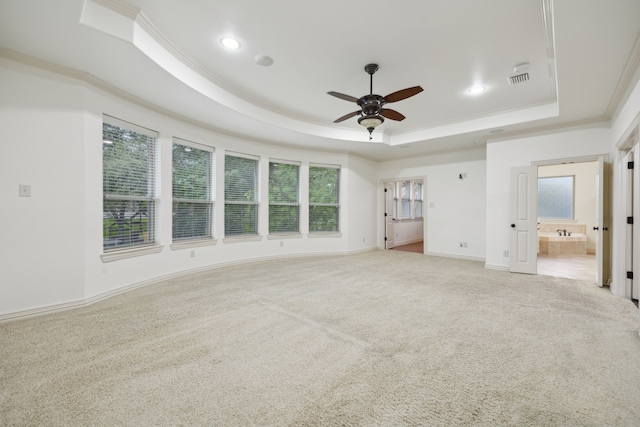 4401 Sorrel Ct, Flower Mound, TX 75028 - unfurnished bedroom with a raised ceiling, ornamental molding, light colored carpet, multiple windows, and recessed lighting