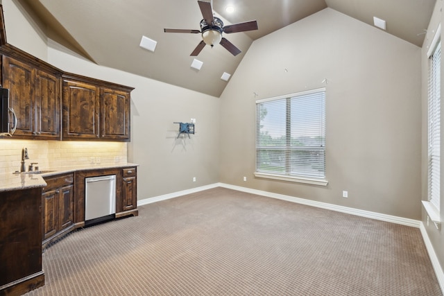 4401 Sorrel Ct, Flower Mound, TX 75028 - bar area featuring a sink, lofted ceiling, stainless steel appliances, light carpet, and a ceiling fan