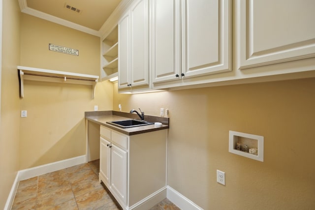 4401 Sorrel Ct, Flower Mound, TX 75028 - laundry area featuring hookup for a washing machine, baseboards, cabinet space, and ornamental molding