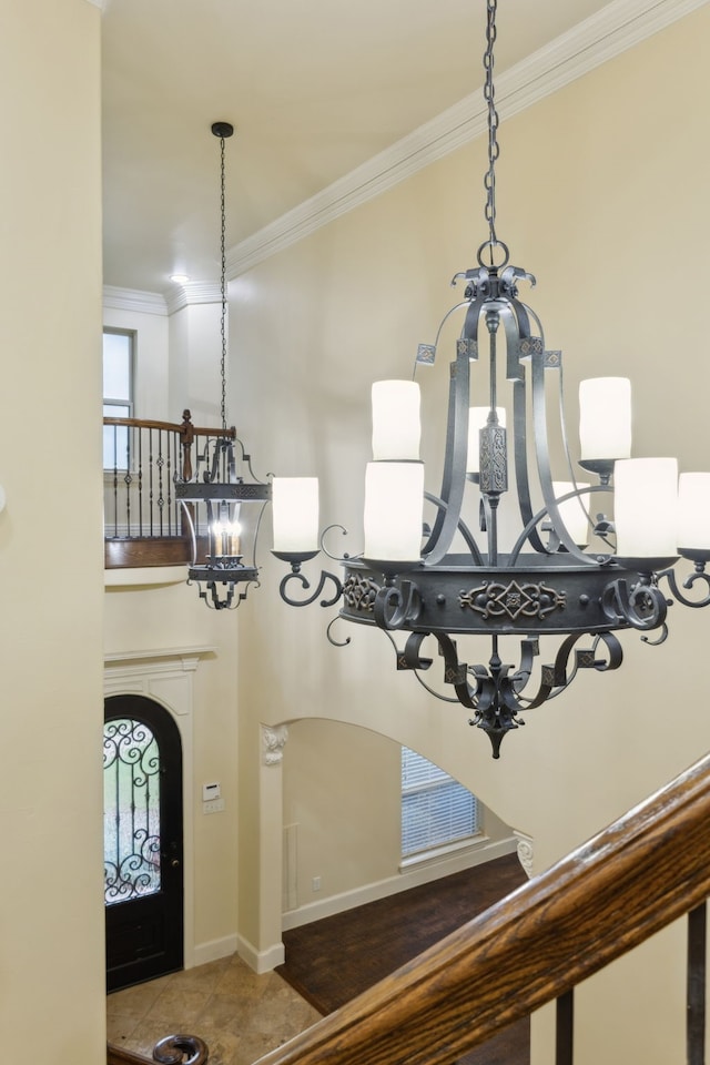 4401 Sorrel Ct, Flower Mound, TX 75028 - detailed view of a chandelier, ornamental molding, and baseboards