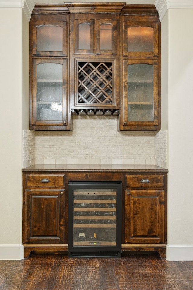 4401 Sorrel Ct, Flower Mound, TX 75028 - indoor dry bar featuring wine cooler, baseboards, and tasteful backsplash