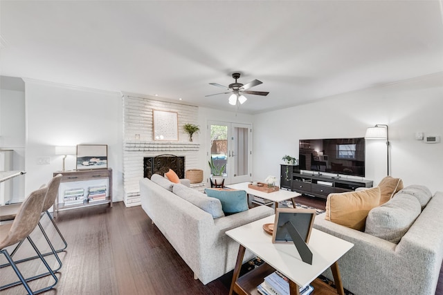 9375 Springwater Dr, Dallas, TX 75228 - living area with a brick fireplace, a ceiling fan, dark wood-style flooring, and recessed lighting