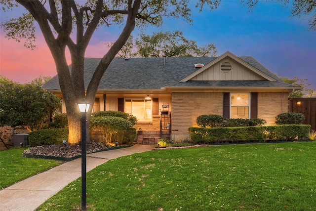 9375 Springwater Dr, Dallas, TX 75228 - single story home featuring brick siding, a shingled roof, and board and batten siding