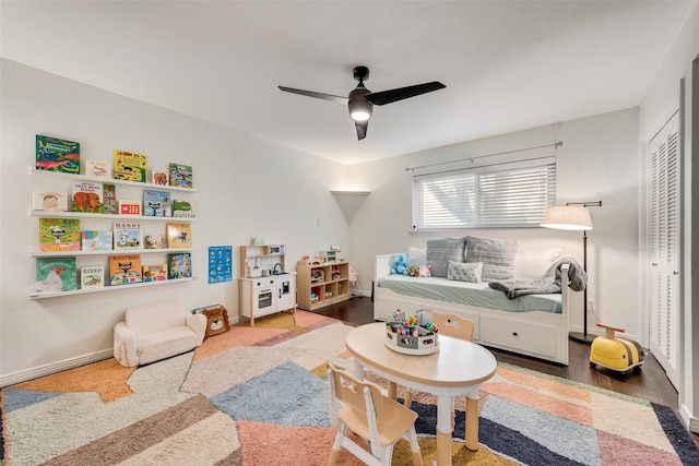 9375 Springwater Dr, Dallas, TX 75228 - living room featuring ceiling fan, wood finished floors, and baseboards