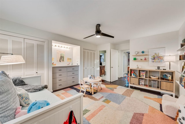9375 Springwater Dr, Dallas, TX 75228 - bedroom with two closets and a ceiling fan