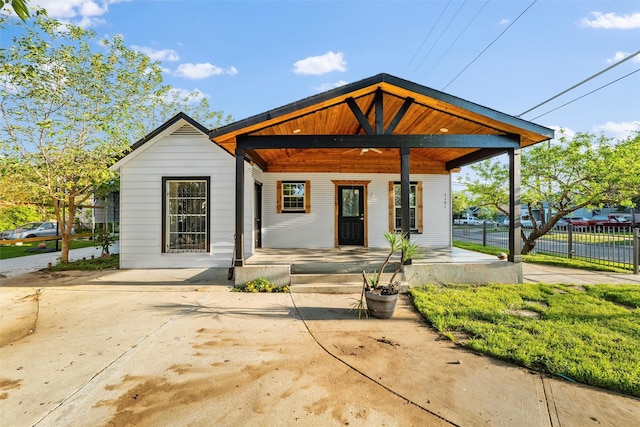 1101 Melbourne Ave, Dallas, TX 75224 - view of front of home with fence and covered porch