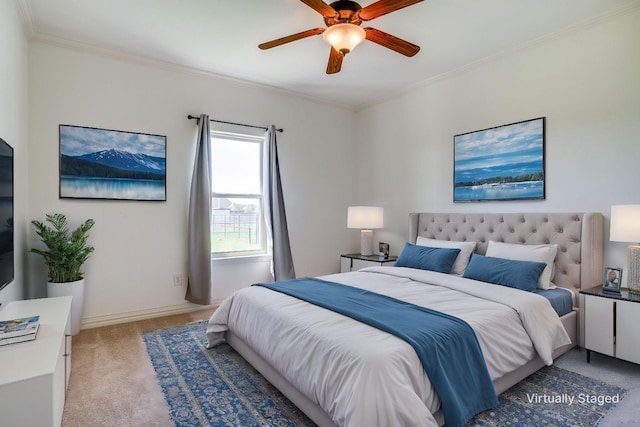 bedroom with ceiling fan, crown molding, and light colored carpet