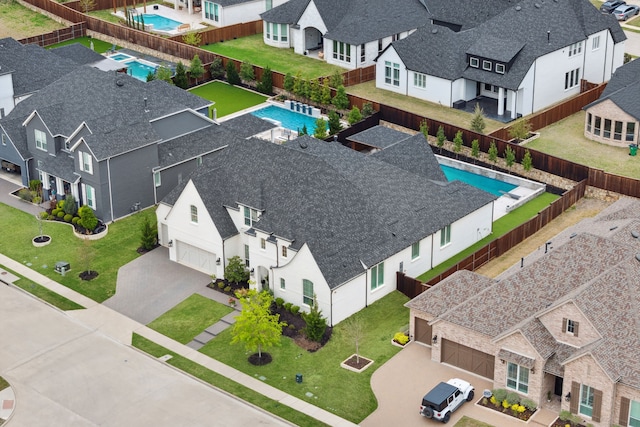 2720 Whirlaway Ct, Celina, TX 75009 - aerial perspective of suburban area with a pool