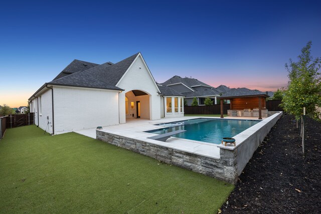 2720 Whirlaway Ct, Celina, TX 75009 - pool at dusk with french doors, a patio area, and a diving board