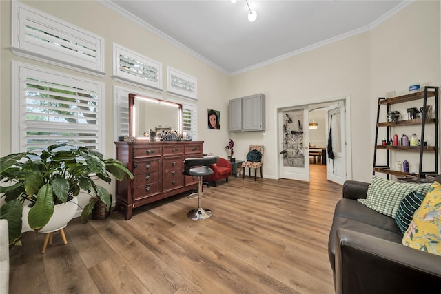 2325 Heather Ridge Dr, Flower Mound, TX 75028 - sitting room with ornamental molding, baseboards, and light wood-style floors