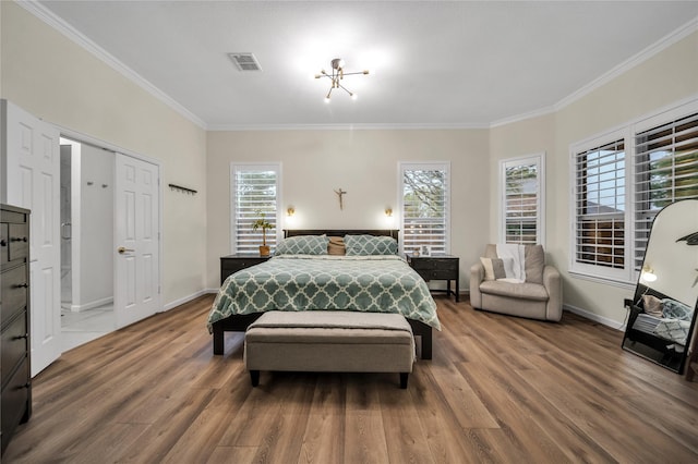 2325 Heather Ridge Dr, Flower Mound, TX 75028 - bedroom with crown molding, wood finished floors, baseboards, and visible vents
