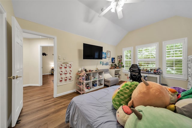 2325 Heather Ridge Dr, Flower Mound, TX 75028 - bedroom with baseboards, wood finished floors, ceiling fan, and vaulted ceiling