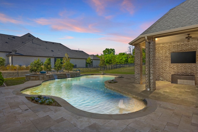 view of pool featuring a ceiling fan, a fenced backyard, a fenced in pool, and a patio