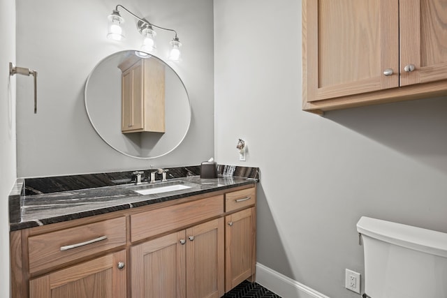2286 White Stag Rd, Celina, TX 75009 - bathroom with vanity, toilet, and baseboards