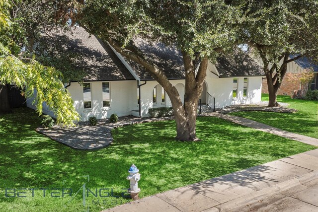 11006 Ferndale Rd, Dallas, TX 75238 - view of front facade with brick siding and a front lawn