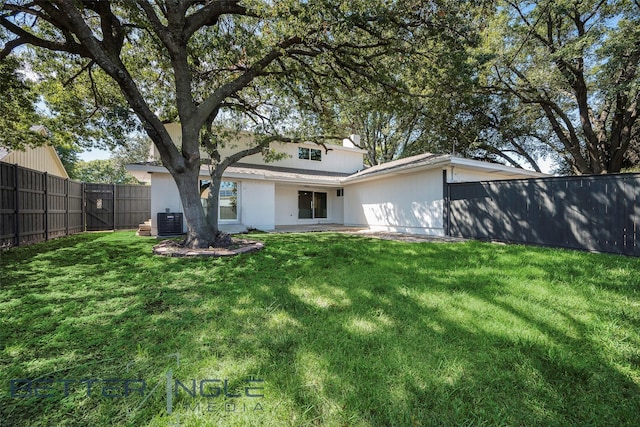 11006 Ferndale Rd, Dallas, TX 75238 - rear view of property with fence, cooling unit, and a lawn