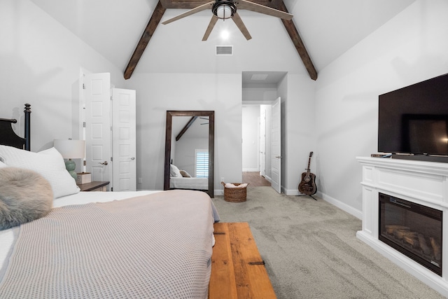 5685 Florance Rd, Northlake, TX 76247 - carpeted bedroom with beam ceiling, baseboards, high vaulted ceiling, a glass covered fireplace, and ceiling fan