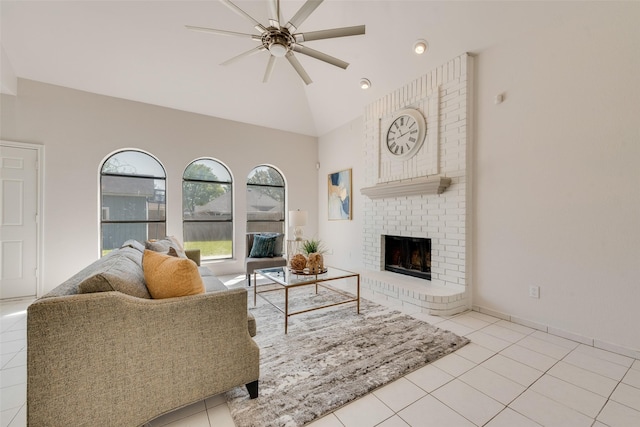 820 Craig Dr, Mesquite, TX 75181 - living area with ceiling fan, a brick fireplace, tile patterned floors, and high vaulted ceiling