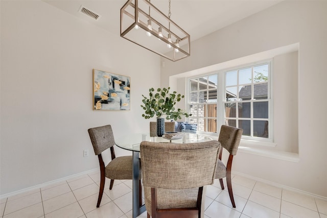 820 Craig Dr, Mesquite, TX 75181 - tiled dining room featuring baseboards and a chandelier