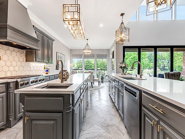 kitchen featuring marble finish floor, custom exhaust hood, stainless steel appliances, and a sink