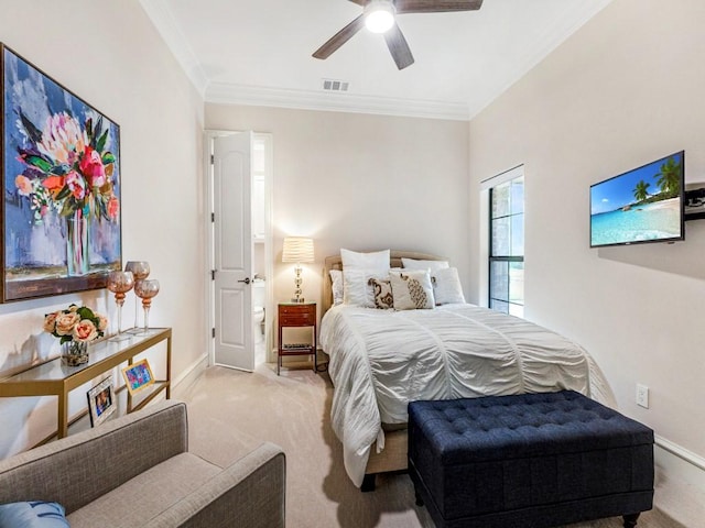 carpeted bedroom with baseboards, crown molding, and visible vents