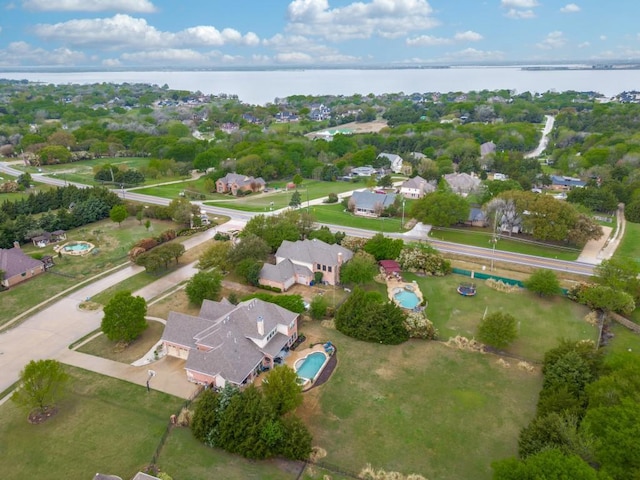 aerial view featuring a residential view and a water view