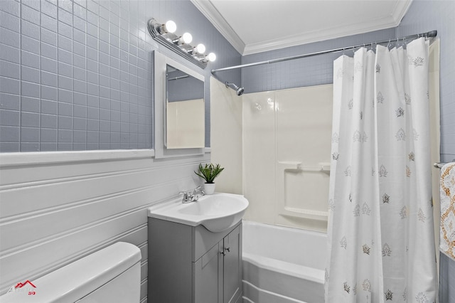 bathroom featuring toilet, crown molding, shower / bathtub combination with curtain, and vanity