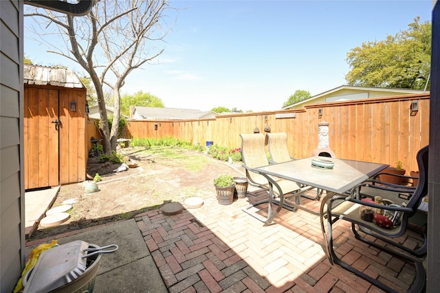 2109 Windy Dr, Garland, TX 75044 - view of patio / terrace with outdoor dining space and a fenced backyard