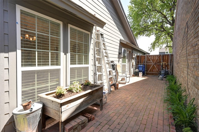 2109 Windy Dr, Garland, TX 75044 - view of patio / terrace with fence and a gate