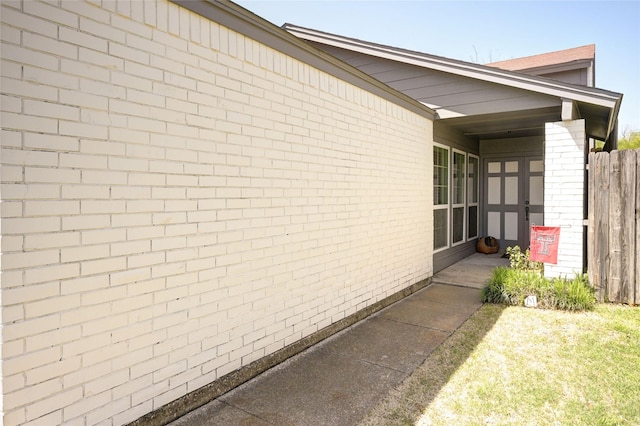 2109 Windy Dr, Garland, TX 75044 - view of property exterior with brick siding and fence