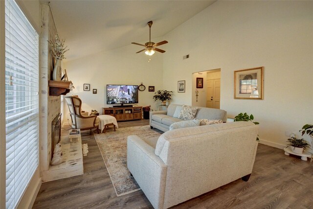 2109 Windy Dr, Garland, TX 75044 - living area with plenty of natural light, dark wood-style flooring, visible vents, and ceiling fan