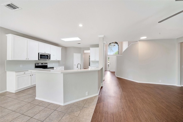 8625 Luzerne Dr, Mckinney, TX 75072 - kitchen with baseboards, light countertops, visible vents, appliances with stainless steel finishes, and a sink