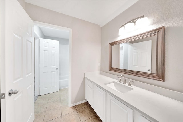 8625 Luzerne Dr, Mckinney, TX 75072 - bathroom with tile patterned flooring, vanity, and baseboards