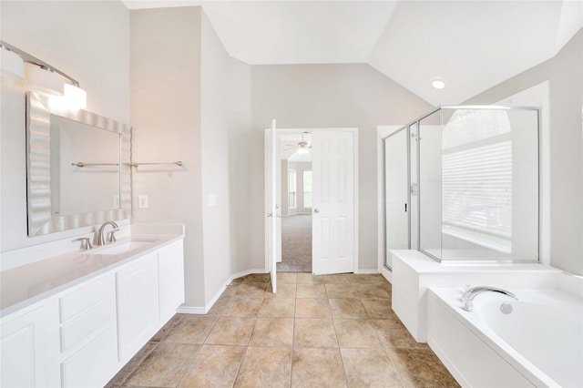 8625 Luzerne Dr, Mckinney, TX 75072 - full bathroom with a stall shower, vanity, ceiling fan, and vaulted ceiling