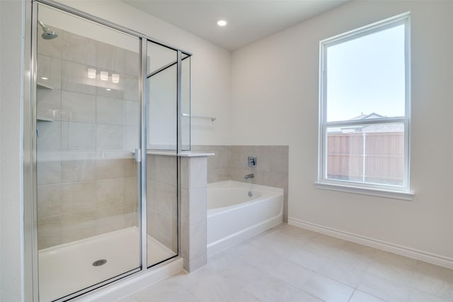 4031 Bedford Dr, Crandall, TX 75114 - full bath featuring a shower stall, a garden tub, and baseboards