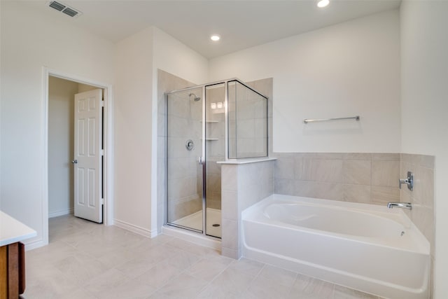 4031 Bedford Dr, Crandall, TX 75114 - full bath featuring a bath, visible vents, tile patterned floors, and a stall shower